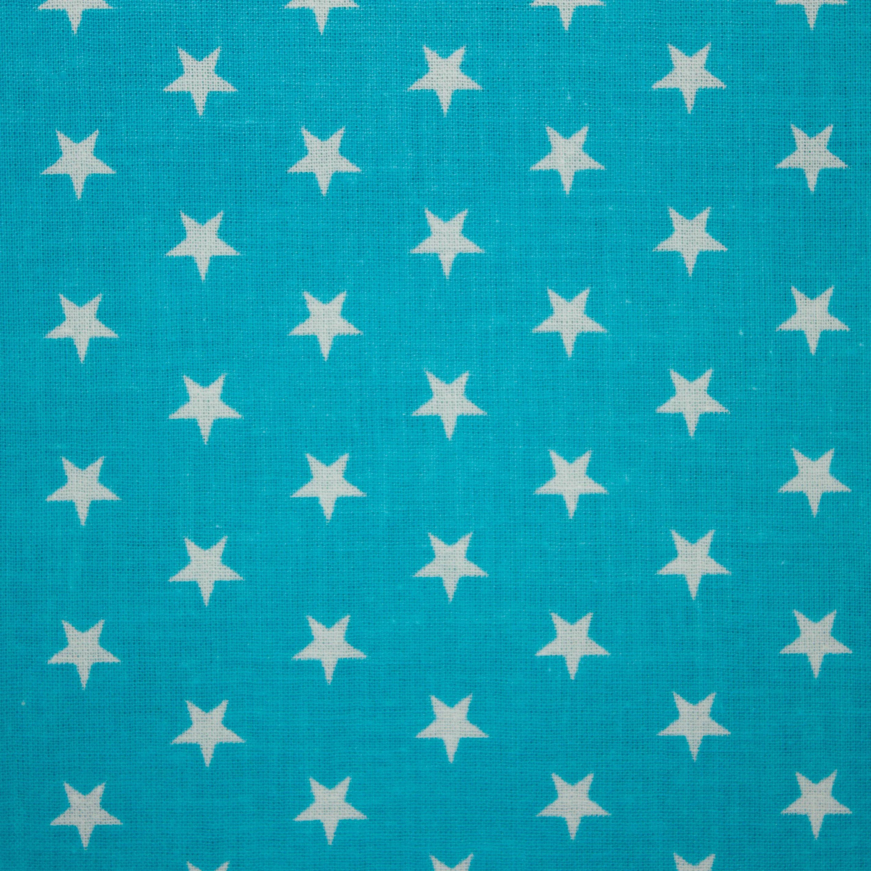 Katoen licht blauw met kleine witte sterren